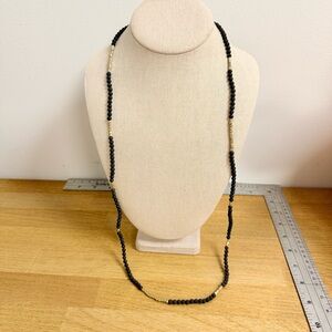 Volcanic rock bead with gold accents stretch necklace